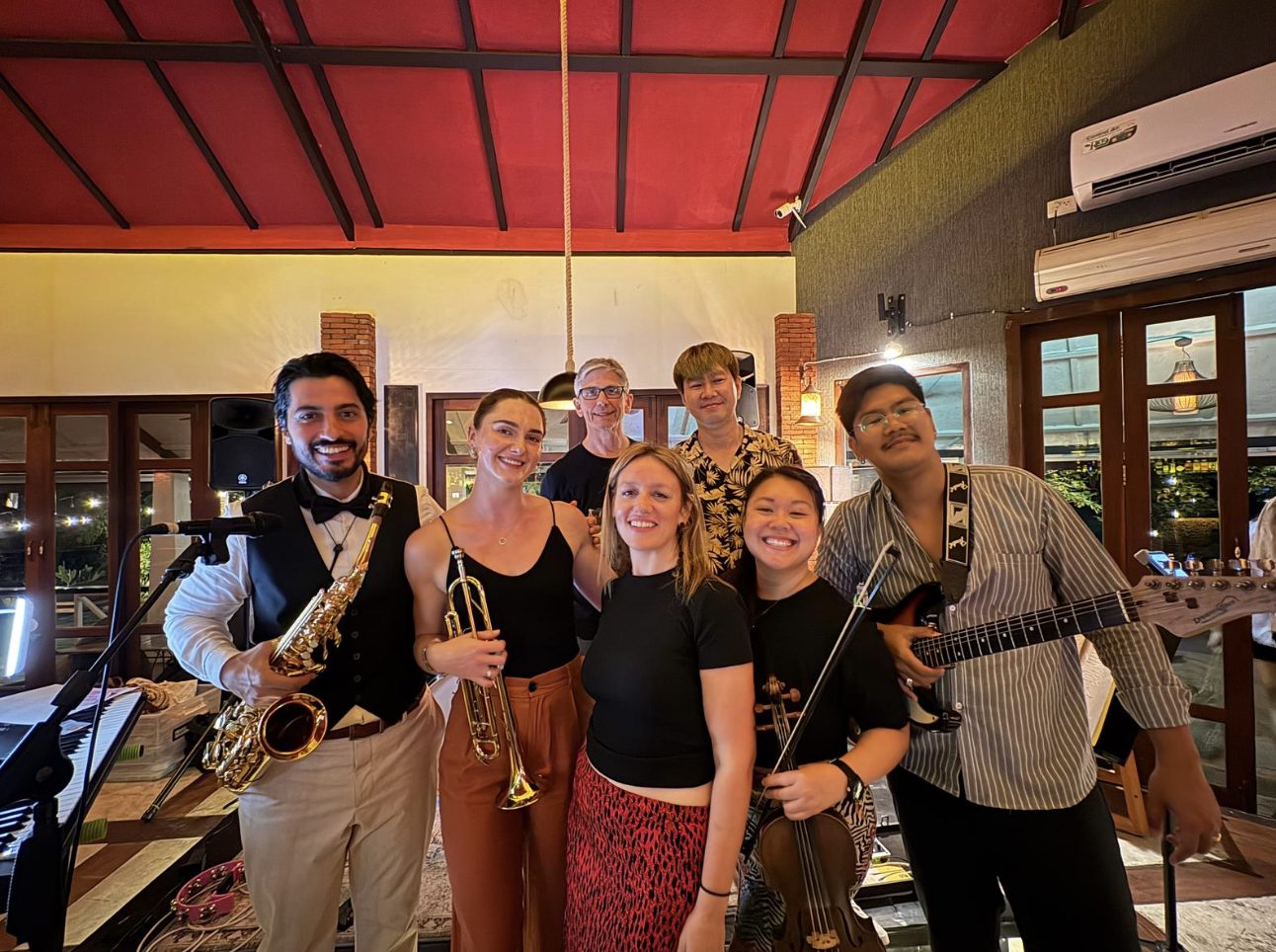 Olivia playing in a band